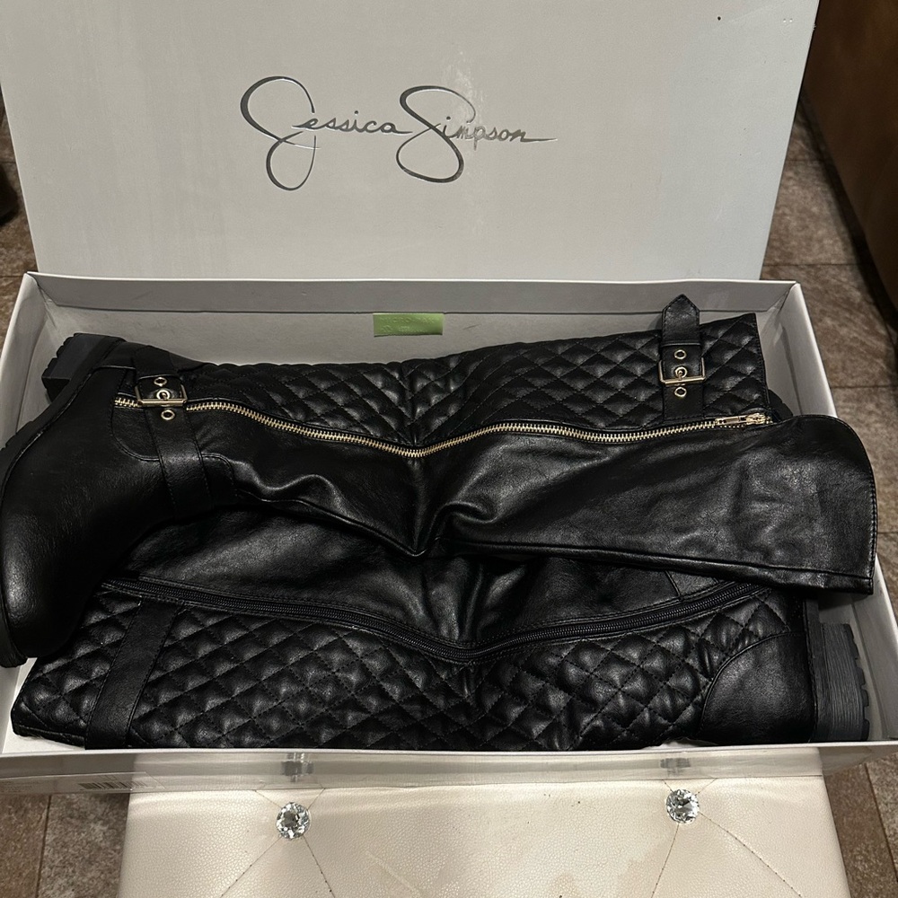 Jessica Simpson Black READE riding boot….And it gives a read!! Tried on ONLY